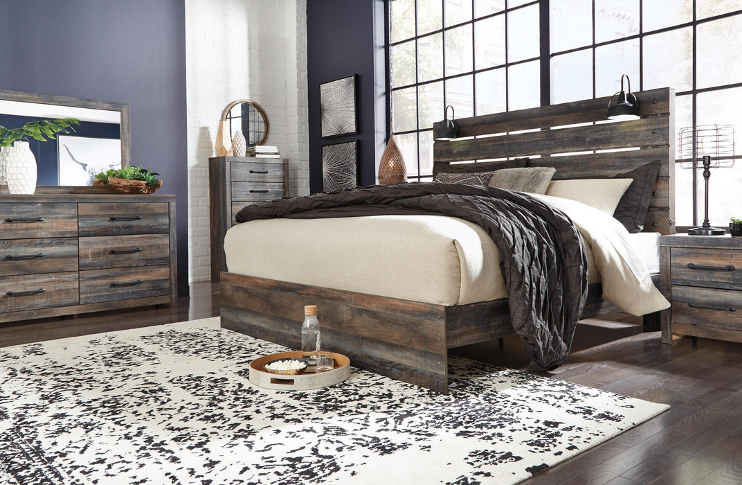 Drystan King Panel Bed, Dresser, Mirror, Chest and Nightstand